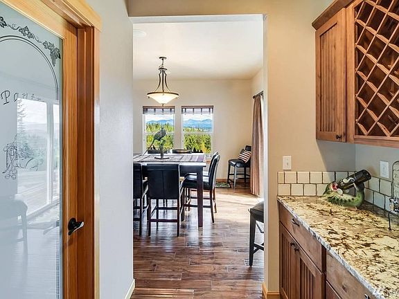 Walk in pantry across from butler bar leading into the dining room of the Large Home.