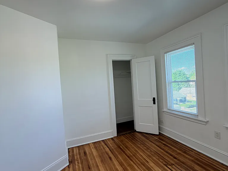 Third bedroom left of bathroom