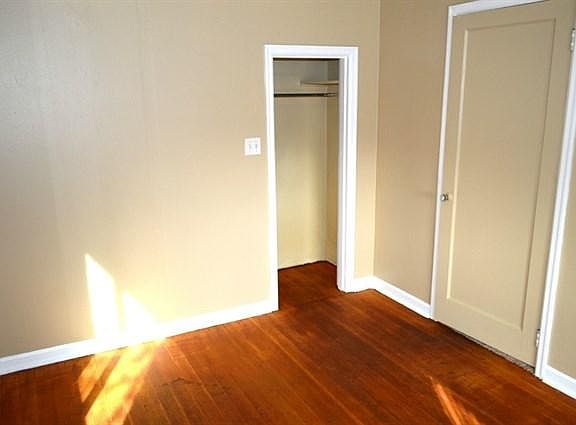 Bedroom with original hardwoods