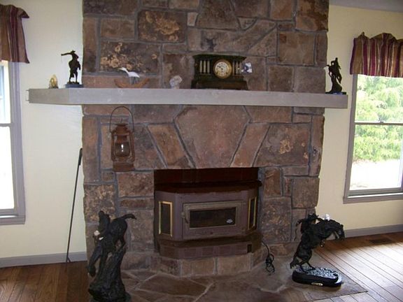 Wood burning stone fireplace