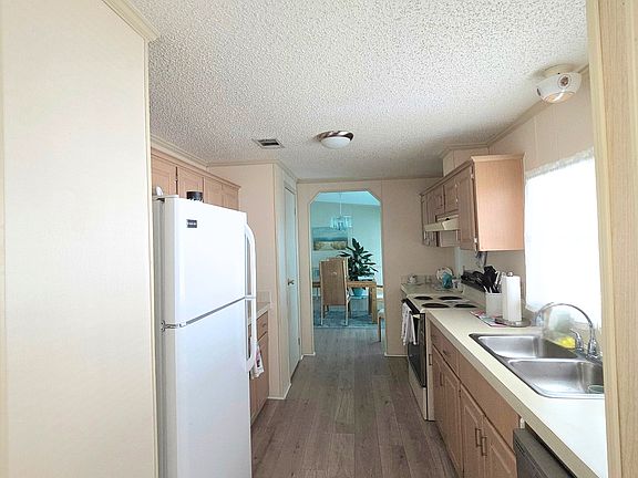 5th image of 7100 SE Carrotwood Ln