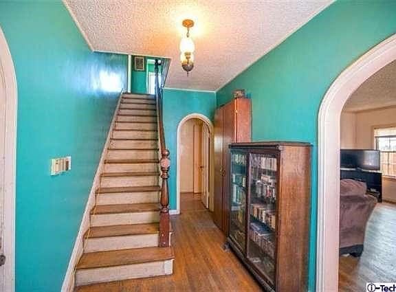 Elegant Entry leading to the Living room to your right - 1 bedroom unit to your left and kitchen