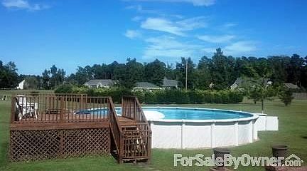 33 ft Salt Water Pool : Just off of the patio relax in the pool or on the deck