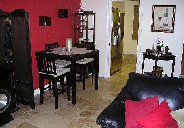 Enough space to fit couch, entertainment and a dining table.