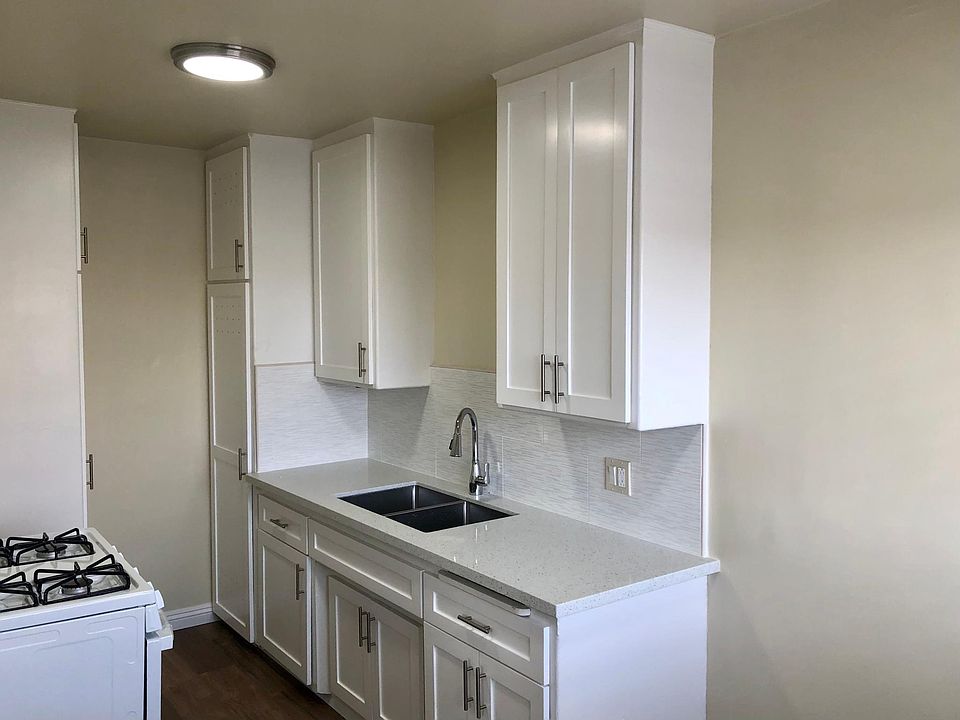 New granite, sink, cabinets
