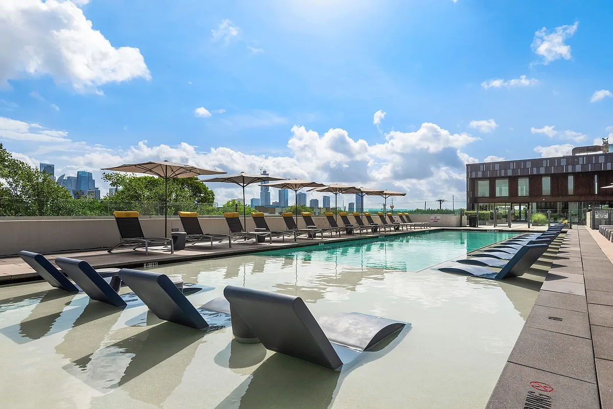 Relaxing Pool Area with Stunning City Views - Lamar Union