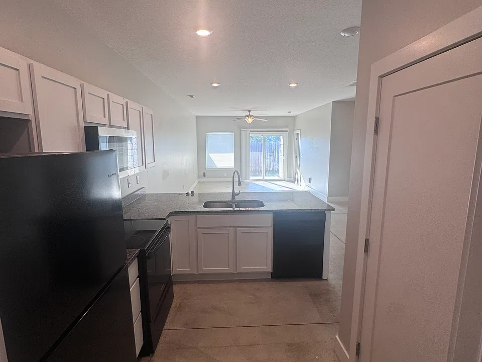 Kitchen looking into Living Area