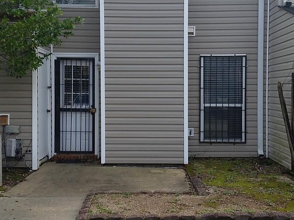 Rear Entrance from designated parking