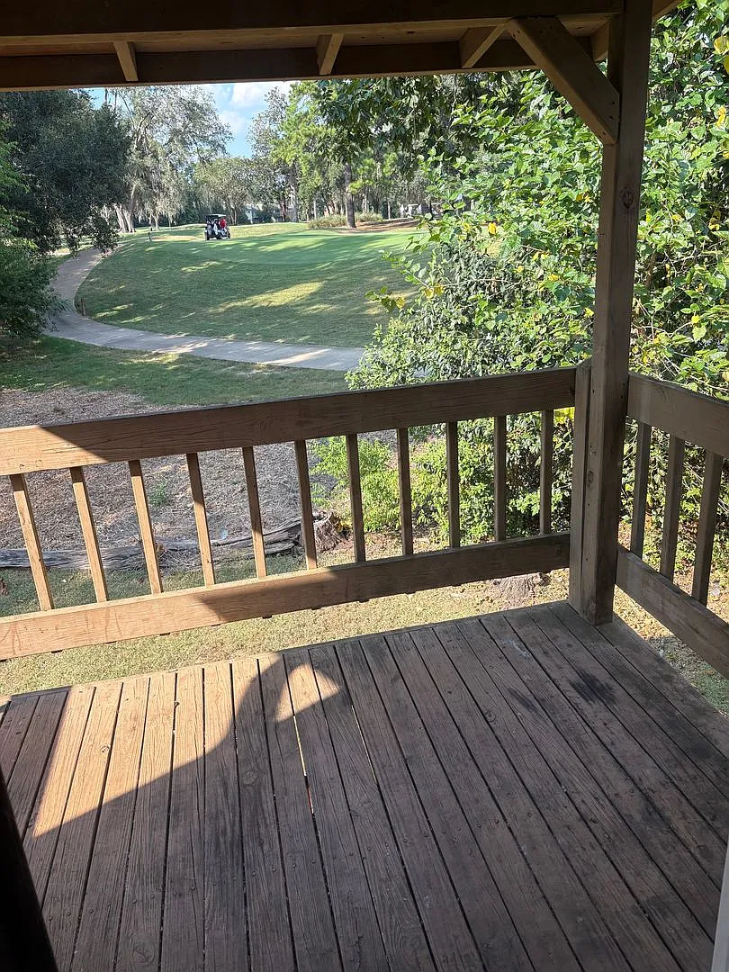 Upstairs unit ON the golf course — Photo 1