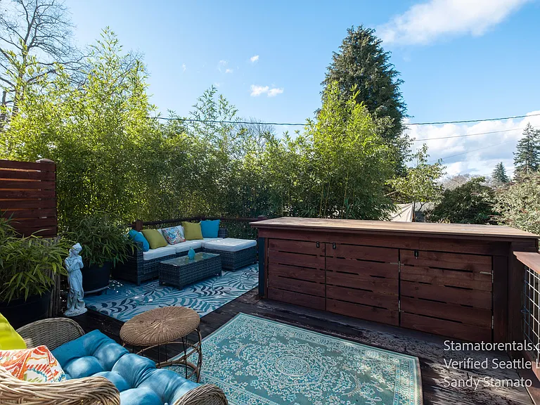 Comfortable outdoor seating creates an inviting space to unwind, visit, or enjoy a meal outdoors.