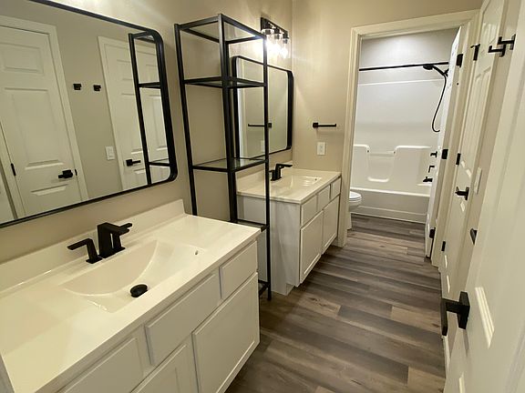 Immaculate double vanity master bath.