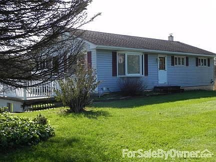 Front of home with patio off of kitchen