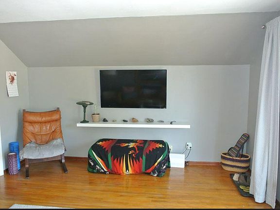 Living Room (photo 2 - wall opposite the previous photo)