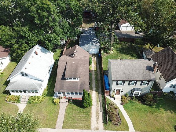 Conveniently located home and walking distance to parks, restaurants and public transit. Huge one car garage and has off street parking! Look at that garage!