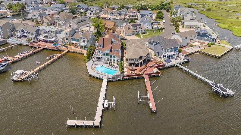 Winter Rental - 7BR Bayfront Escape w/ Heated Pool, Game Room, Balconies & Stunning Water Views — Photo 1