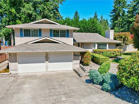 House offers a two car garage and plenty of guest parking plus RV parking left of driveway.