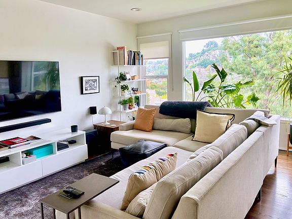 Furnished inspiration showing a TV and entertainment setup.