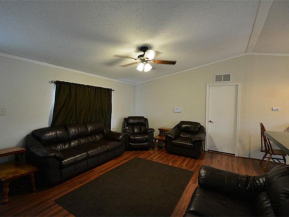LARGE LIVING AREA. LAMINATE WOOD FLOORS. FURNITURE NEGOTIABLE.