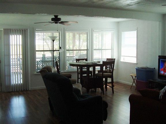 Upstairs Open Dining on Waterfront Side of Home
