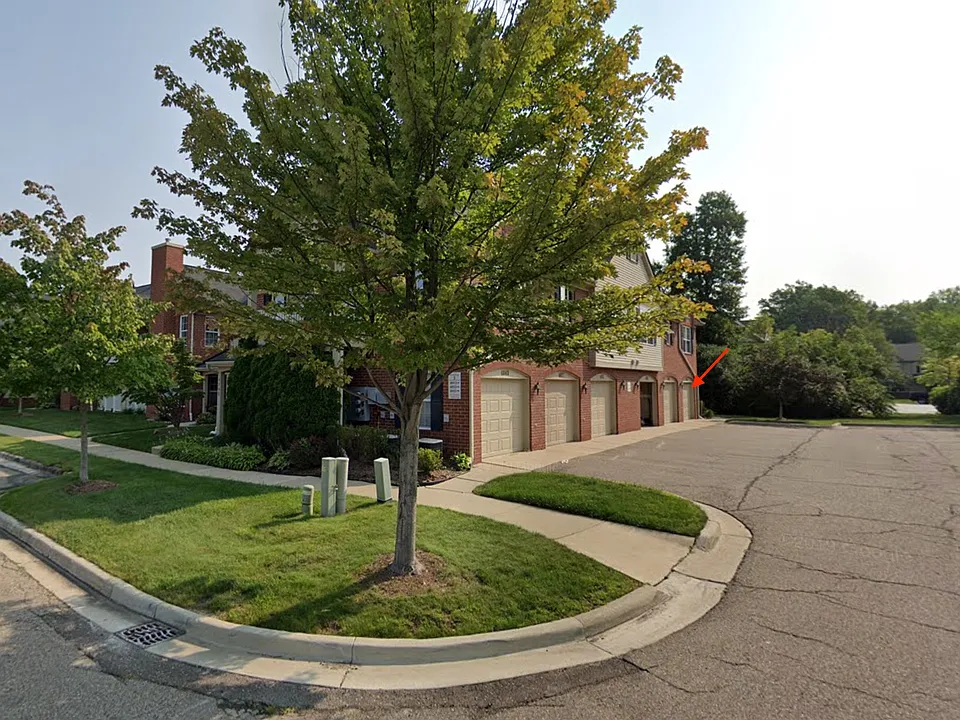 Single car garage with additional parking nearby