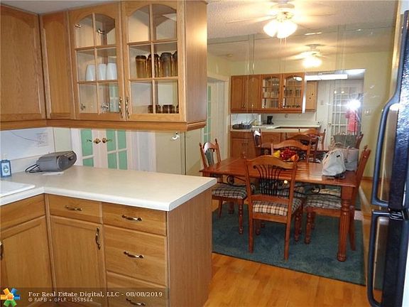 VIEW FROM KITCHEN TO DINING ROOM