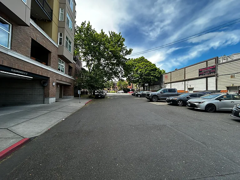 Standing on Russell ave. and looking North towards Kangaroo and Kiwi. Parking garage entrance to the left.
