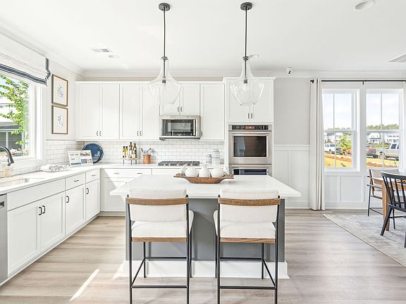 The kitchen in the Sage by Brookfield Residential at Nexton.