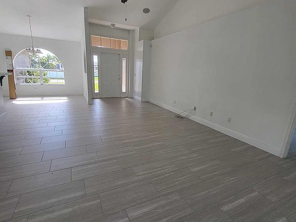 Ceiling fans throughout.