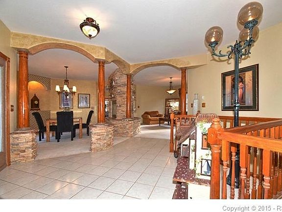 Impressive foyer opens to formal dining and living rooms