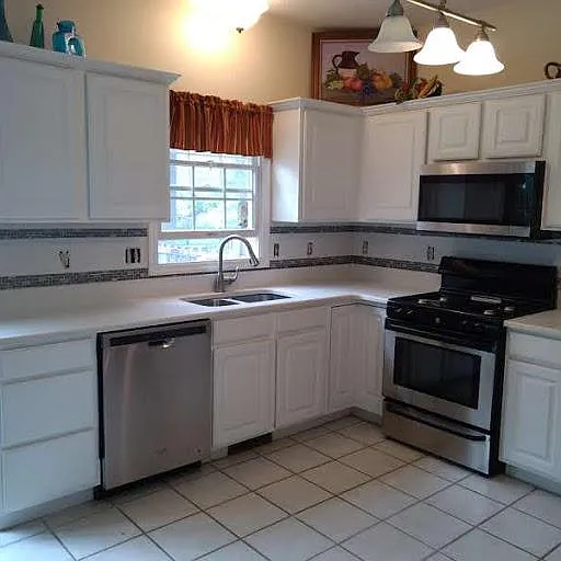 Recently Installed High Quality Quartz Countertops and Custom Ceramic Glass Backsplash!