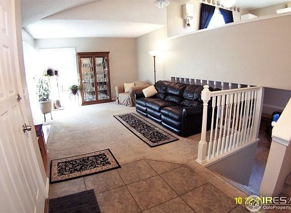 Formal living room with gas fireplace