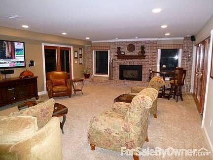 Spring/Summer Front
						:
						Mix of newer & established landscaping. Box woods line the paver walkway.