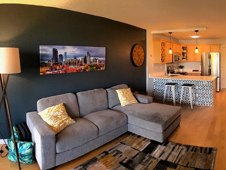 Open floor plan, all new hardwood floors, cozy furnishings.