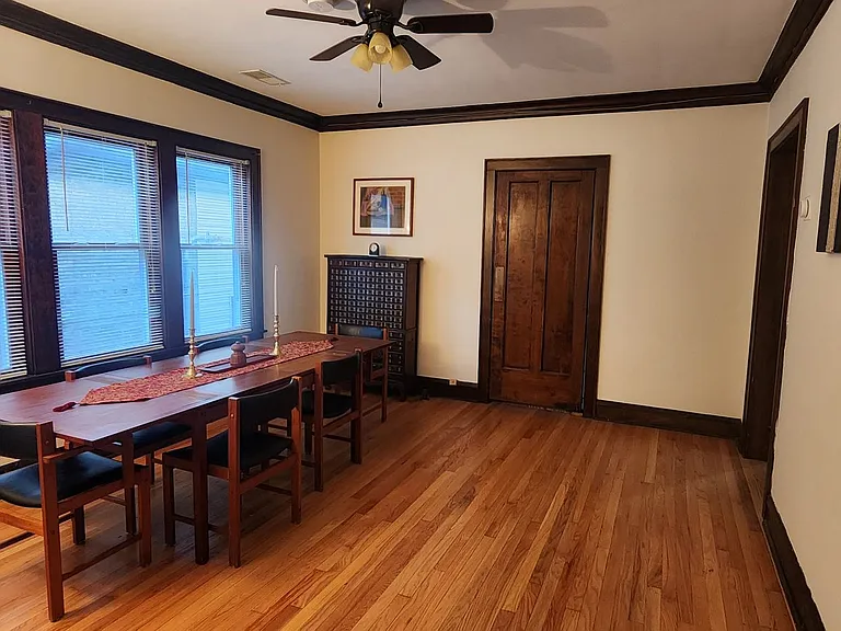 Dining Room includes a table that can be extended (seating 6-10 people), a Korean medicine chest, a plant stand, artwork and lamp.
