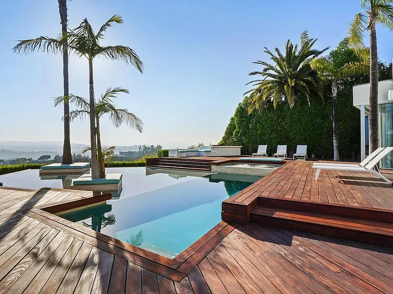 Find peace and tranquility on the outdoor deck, a serene oasis where you can escape the hustle and bustle of everyday life.