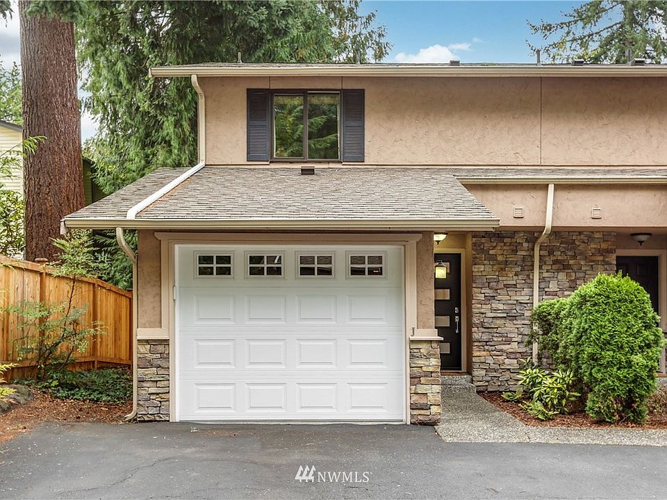 This peacful end unit is tucked in the back of a small well maintained complex