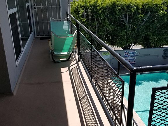 BALCONY OVERLOOKING POOL
