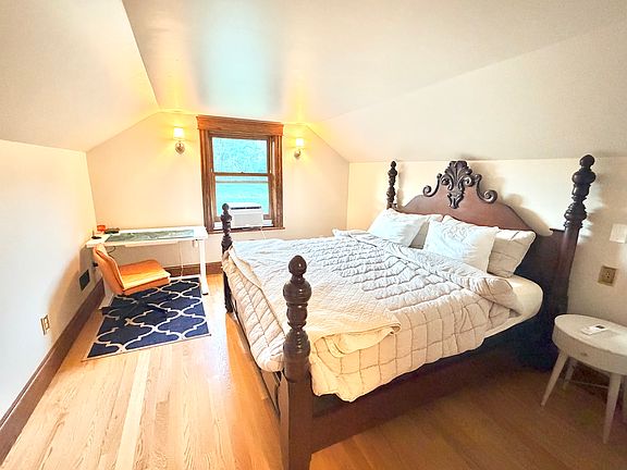 New bedroom (king bed shown) above garage with en-suite bath