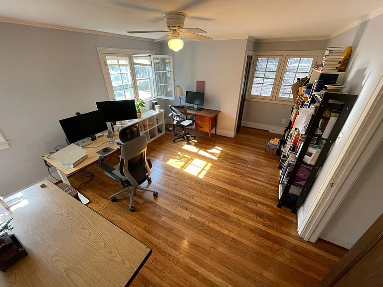 Bedroom that is used as a workspace