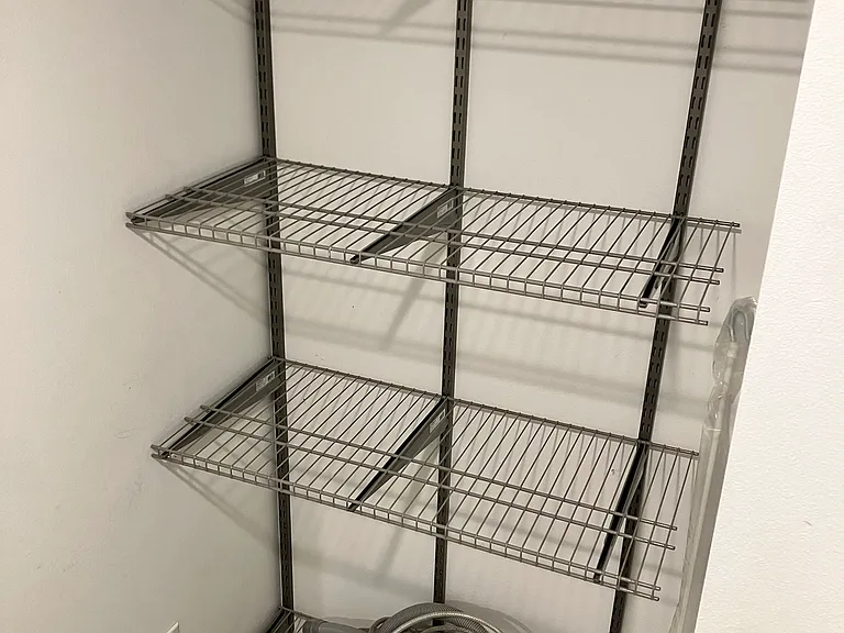 Basement hall from garage: storage for interior supplies/foods etc