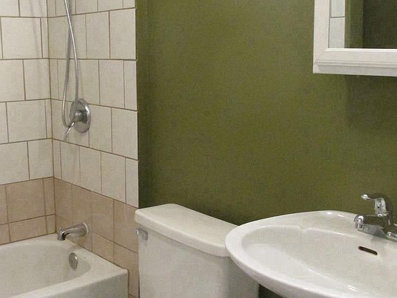 Bathroom with tub and shower.