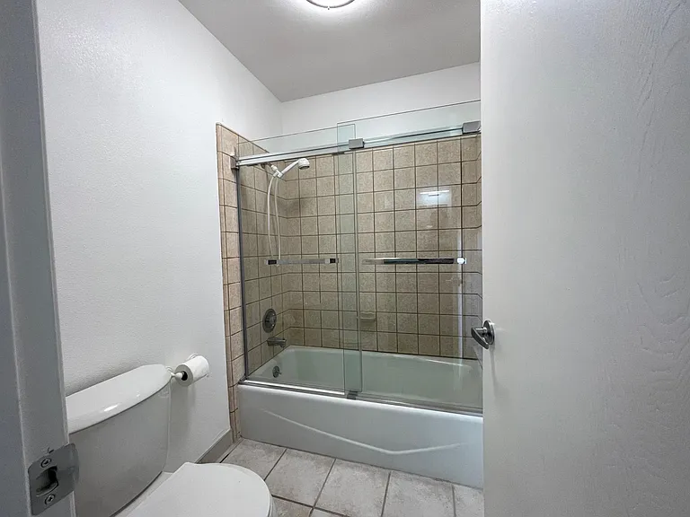 New toilets and tub sliding doors.