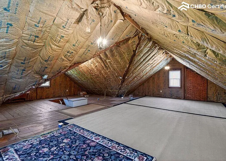 Unfinished attic space offers storage