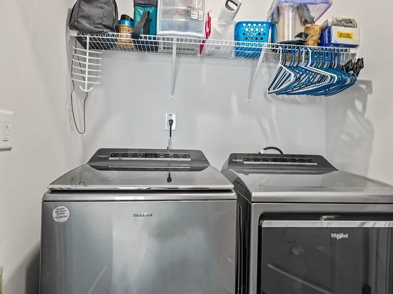 New and fully functioning washer and dryer in laundry room downstairs