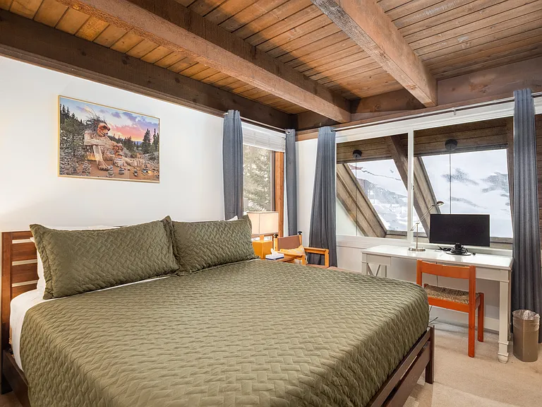 Primary bedroom with ensuite. Outdoor views.