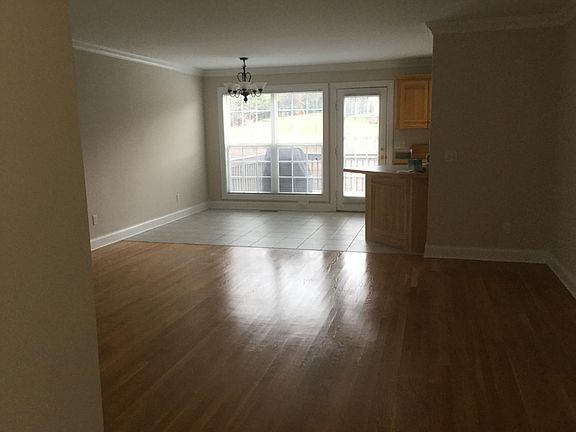 View from Front door entrance of Den and Breakfast Nook and Access to Large Deck.
