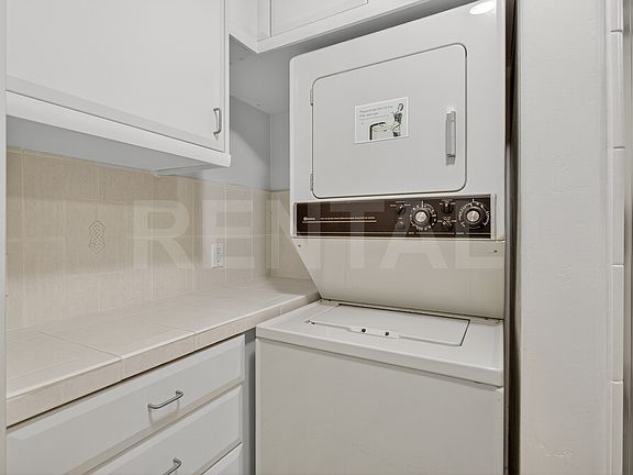 Laundry area is in the downstairs bathroom.