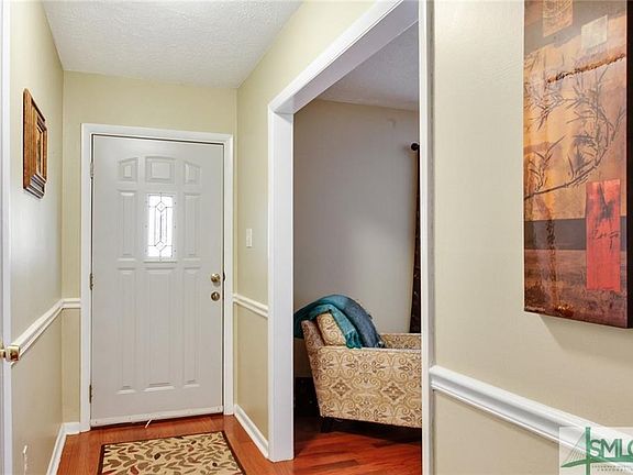 Foyer entrance with coat closet