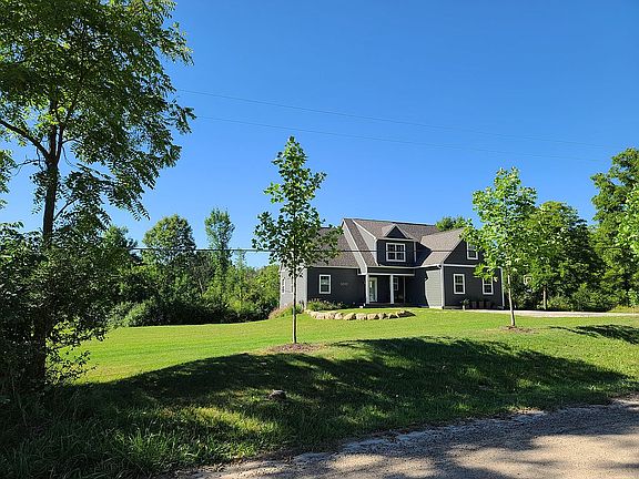 Berm with tulip trees