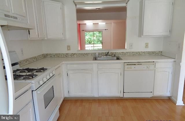 2nd image of 14405 Long Green Dr #1